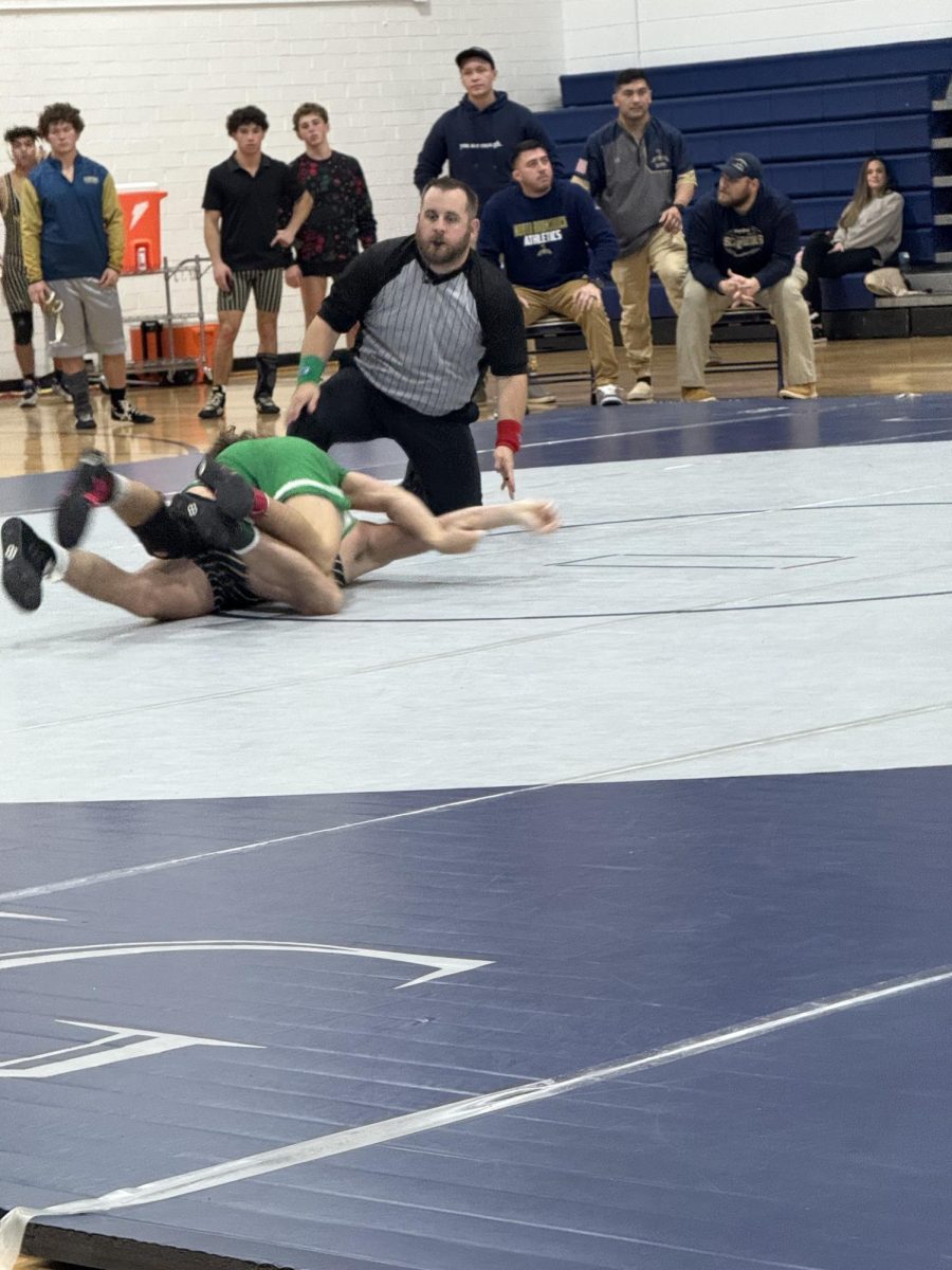Junior Josh Connick taking on his opponent. 