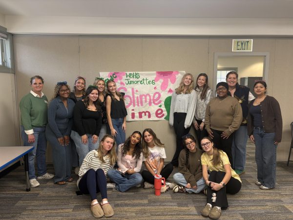 The Juniorettes clubwomen showing off their artistic banner. 