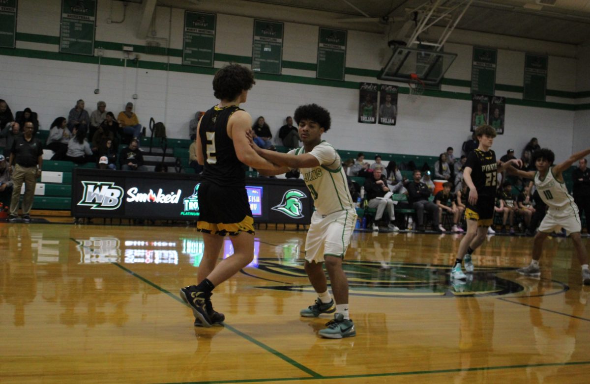 Sophomore Elijah Bell setting up defense on opponent.