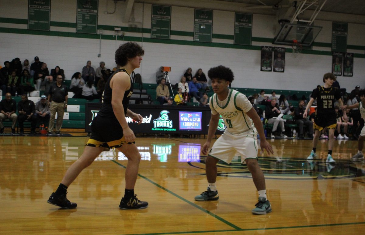 Sophomore Elijah Bell guarding his opponent.