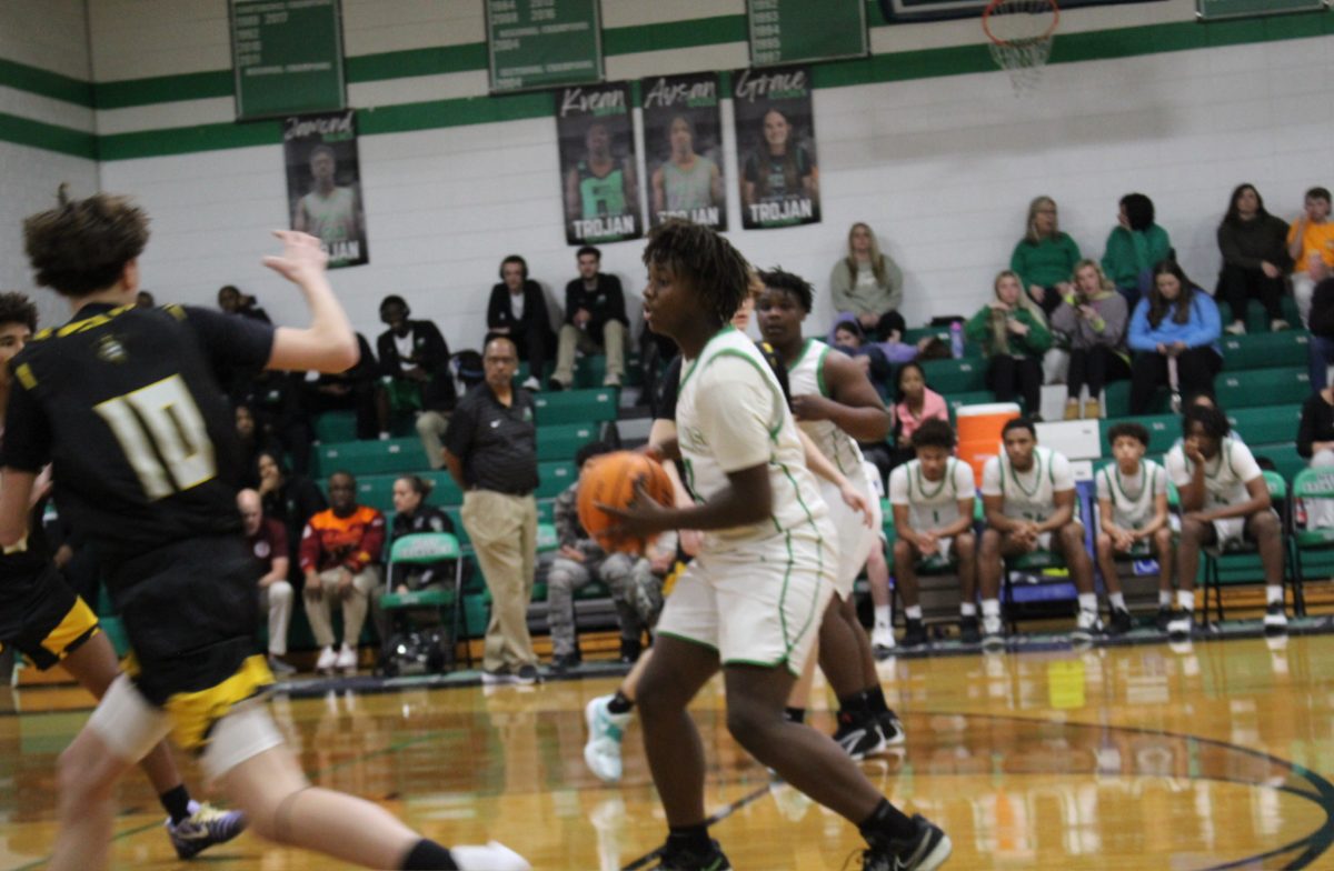 Freshman Bryce Vaught making his way down to the net.