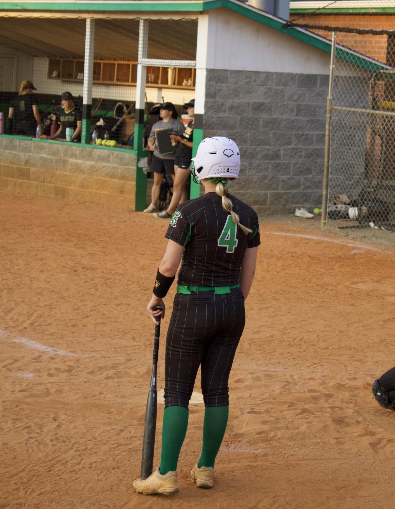 Senior Olivia Brown going up to bat during the game.